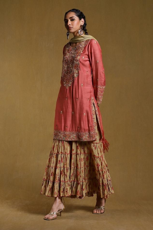 Pink kurta with floral embroidery and round neckline. Paired with crinkled sharara and chanderi dupatta.
Component: 3
Pattern: Embroidered
Type Of Work: Floral
Neckline: Round
Sleeve Type: Long
Fabric: Kurta: Muga Silk, Sharara: Cotton Voile 92X80, Dupatta: Chanderi
Color: Pink
Other Details: 
Floral embroidery
Crinkled sharara
Occasion: Puja - Aza Fashions Festive Dola Silk Sharara With Floral Embroidery, Designer Sharara With Intricate Embroidery In Raw Silk, Designer Raw Silk Sharara With Intricate Embroidery, Unstitched Raw Silk Sharara With Intricate Embroidery, Raw Silk Sharara With Resham Embroidery For Reception, Floor-length Sharara With Embroidery In Raw Silk, Floor-length Embroidered Sharara In Raw Silk, Intricate Embroidery Raw Silk Sharara For Reception, Embroidered Floor-length Raw Silk Sharara