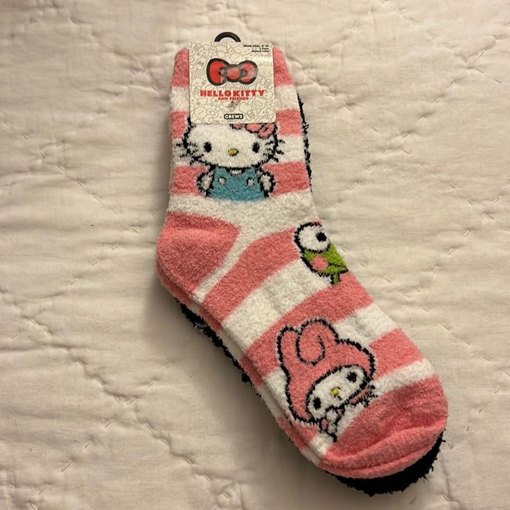 Hello Kitty & Friends Crew Fuzzy Socks 2 Pairs Size: 4-10 Cute Super Soft Socks For Playtime, Cute Winter Non-slip Socks, Cute Soft Pink Socks, Fun Pink Socks For Stocking Stuffers, Cute Black Non-slip Socks, Cute Super Soft Socks For Indoor, Cute Super Soft Indoor Socks, Super Soft Pink Socks For Indoor Use, Fun Pink Socks For Winter