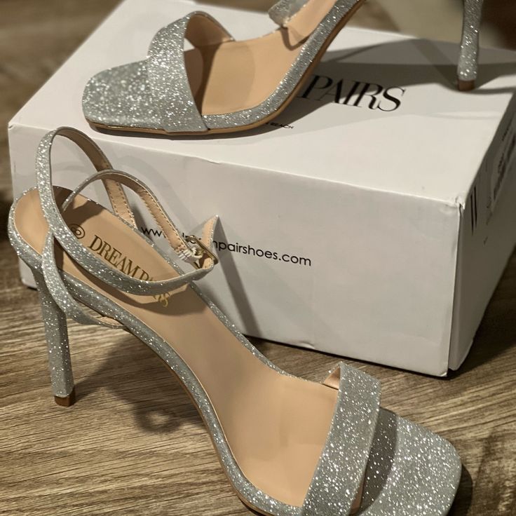 Beautiful New Silver Straps High Heel. Never Been Worn In The Box. 4 Inch Heel. Heels Glitter Silver, Silver Heels Thick Heel, Black And Silver Heels Prom, Glittery Silver Heels, High Heels Silver Shoes, Prom Silver Heels, Prom High Heel, Cute Silver Heels, Silver Diamond Heels