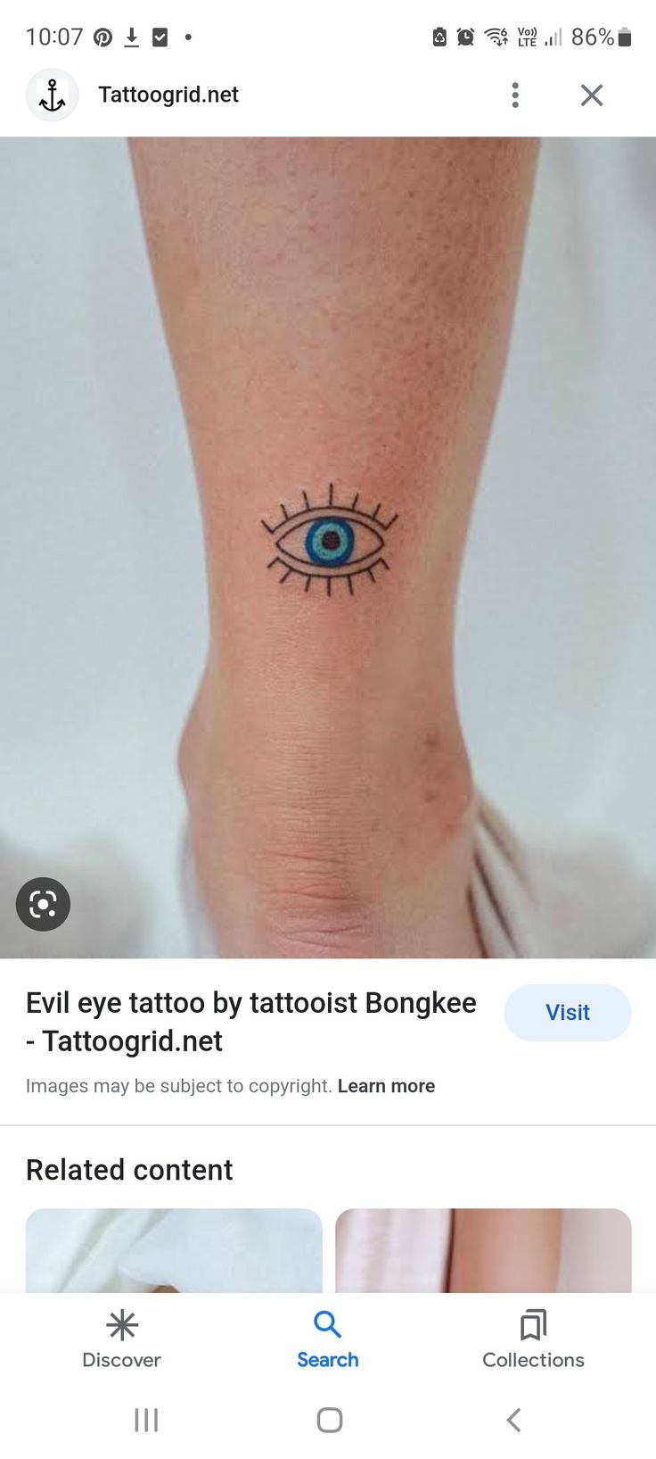 an image of a tattoo on someone's foot with the word evil eye tattooed on it