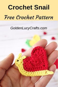 a crocheted heart is held in someone's hand with the text, crochet snail free crochet pattern