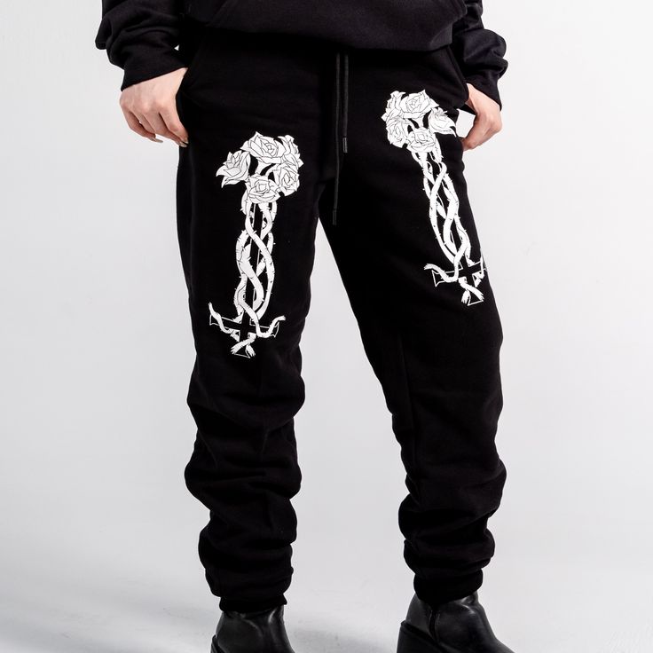 Unisex "Jogger" Style Sweatpants from Forbidden Alchemy. Designed for both comfort and style, these slim-fitting joggers feature a tapered ankle for a sleek silhouette that flatters all body types. Crafted from a premium blend of 80% cotton and 20% polyester, they offer the perfect balance of softness and durability, ensuring all-day comfort and long-lasting wear. Slim Fit: Tailored to hug your body while allowing ease of movement. Tapered Ankle: Provides a modern, streamlined look. Premium Fabr Hip Hop Tapered Leg Sweatpants For Streetwear, Hip Hop Style Tapered Leg Sweatpants For Streetwear, Urban Streetwear Sweatpants, Winter Tapered Leg Joggers For Streetwear, Urban Ankle-length Sweatpants For Streetwear, Fitted Tapered Leg Streetwear Bottoms, Fitted Tapered Leg Bottoms For Streetwear, Winter Streetwear Sweatpants With Tapered Leg, Winter Streetwear Tapered Leg Sweatpants