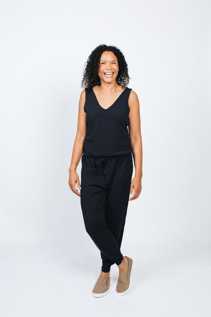 The best part about a jumpsuit is that you have an entire outfit in one piece. It feels like a sweatsuit but looks stylish and polished. The drawstring waist is adjustable and made to flatter. We’ve paired this piece with sneakers and a jean jacket for a stylish weekend ensemble. It also looks great with the Peg hoodie for a sportier look. The jumpsuit paired with a long-sleeved shirt layered underneath is another great look. Non-stretch Medium Wash Denim Jumpsuit For Spring, Mid-rise Cotton Denim Jumpsuit With Relaxed Fit, Non-stretch Dark Wash Denim Jumpsuit, Black Athleisure Jumpsuit With Built-in Bra, Non-stretch Medium Wash Denim Jumpsuit, Sporty Look, Drawstring Waist, Jean Jacket, Looks Great