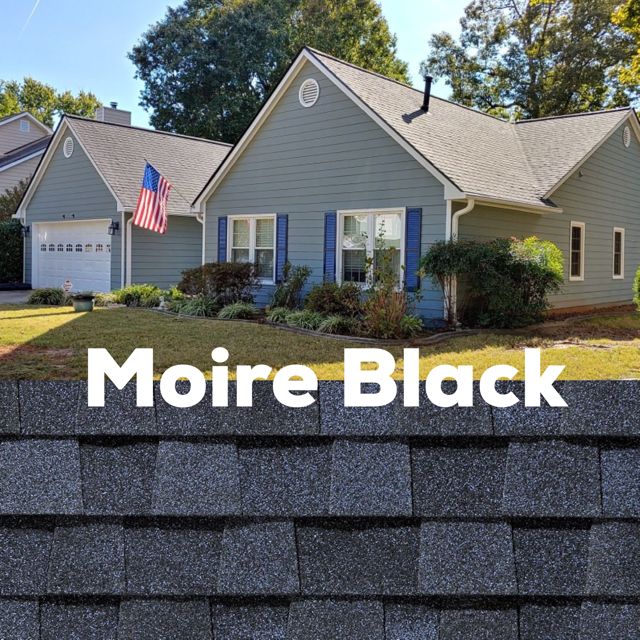 a gray house with the words moire black on it and an american flag in front