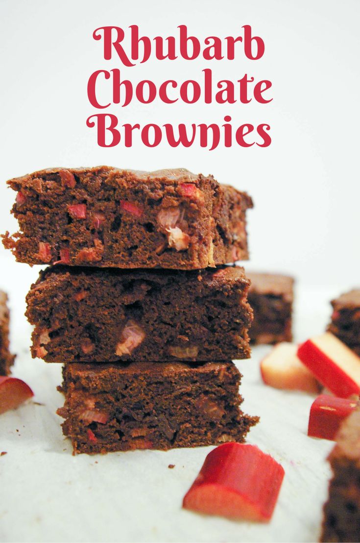 chocolate brownies stacked on top of each other with rhubarb in the middle