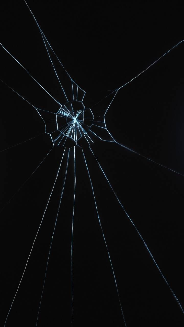 an image of a broken glass in the dark