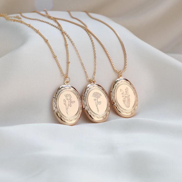 "If you choose the \"Picture\" option, we'll put the image on the locket.  Use the \"contact shop owner\" button to send us the picture, or you can email it to hoiaucraft@outlook.com. (We can put up two pictures) HOW TO ORDER? All three sides can be customized.  Specify which side, Chain Type you prefer.  (We can put up two pictures) For example: Side 1: Engraving, Flower: Rose Side 2: Engraving, \"Love mom\" (50 Characters limit) (Accept your handwriting) Side 3: Picture Box chain The default chain length is 18 inches.  If you require a different chain length, please leave a note in the personalized box during checkout. ♥ D E T A I L S ♥ ---Locket Size: 35mm * 25mm ---Come with Individual Gift Box. READY TO GIFT. ---All items are handmade with love, Custom items do take a little extra tim Bouquet Locket, Rear View Mirror Accessories, Oval Locket, Christmas Gift For Mom, Gifts For Christmas, Unique Gifts For Women, Photo Gift, Shop Owner, Birth Flower