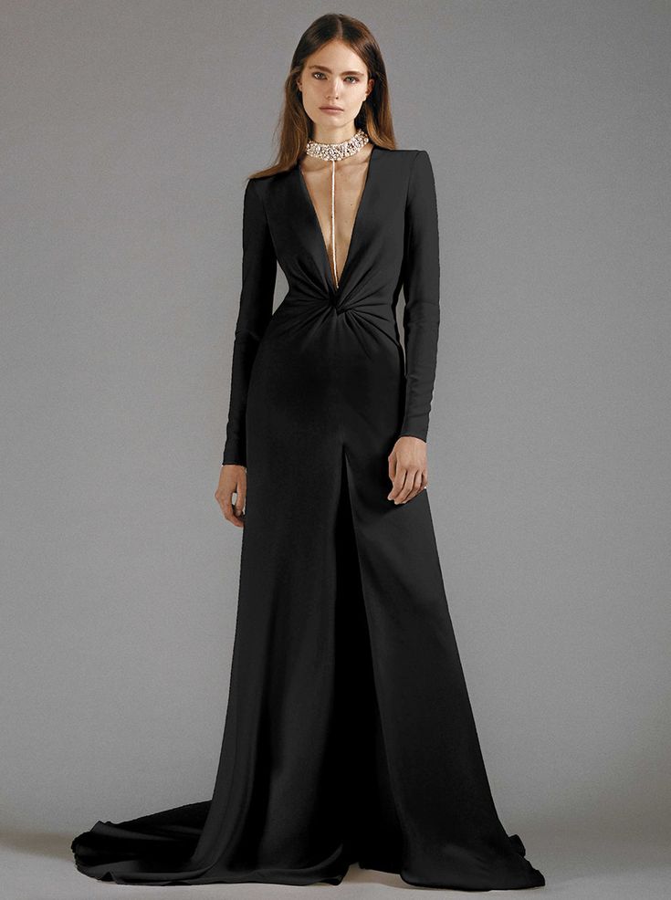 Her plunging V-neckline, intricate twist detail, long-sleeve, and high front slit with sweeping train makes "Jasmine" in black feel refined and sexy. Featuring an undergarment bodysuit to accentuate the body and to ensure full coverage. Available separately, a pearl lariat choker adds a glamorous touch. Galia Lahav Bridal, Black Evening Dress, Pearl Lariat, Black Evening Gown, Jasmine Dress, Galia Lahav, Silk Tulle, Fashion Gowns, Ball Gown Skirt