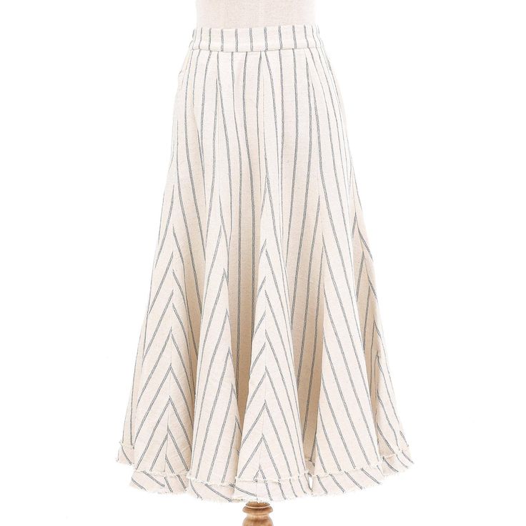 This midi skirt from Thai artisan Jamriang will quickly become a favorite, with its comfortable fit and feminine silhouette. Crafted from cotton, the striped skirt features an elasticized waistband, two side pockets and a stylish raw-edge hem. Relaxed Fit Cotton Full Skirt, Chic Skirt With Striped Hem And Relaxed Fit, Chic Relaxed Skirt With Striped Hem, Cotton Maxi Skirt With Relaxed Fit And Lining, Spring Striped Flared Skirt, Cotton Full Skirt With Lining, Full Cotton Skirt With Lining, Spring Striped Midi Skirt, Spring Striped Long Skirt