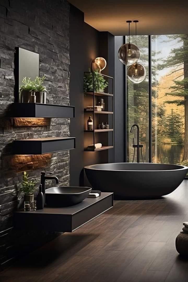 a modern bathroom with stone walls and wood flooring, large bathtub in the center