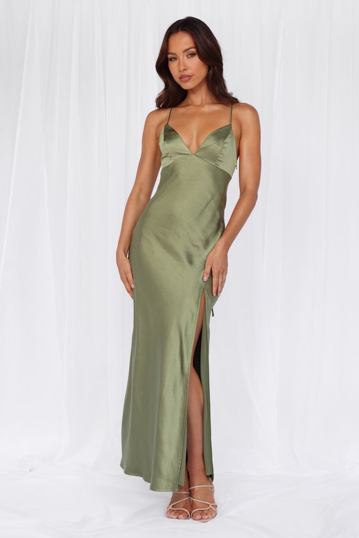 Length from top of bust to hem of size S: 125cm. 
 Chest: 38cm, Waist: 31cm, across front only of size S. 
 Maxi dress. 
 Lined. 
 Model is a standard XS and is wearing size XS. 
 True to size. 
 Non-stretch. 
 Luxurious satin. 
 V-neckline. 
 Open back with crisscross tie-up. 
 Elastic back. 
 Split to skirt. 
 Straight, flowy silhouette. 
 Zipper with hook eye closure.  
 Cold hand wash only. 
 Polyester. 
 This material is very delicate. Please handle with care. 
 Please Note: This product is Sage Satin Dress, Green Satin Bridesmaid Dresses, Flowy Silk Dress, Sage Green Maxi Dress, Olive Green Dress, Candy Dress, Skirt Straight, Green Silk Dresses, Dress Idea