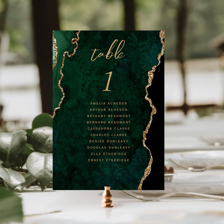 a table is set with place cards and silverware