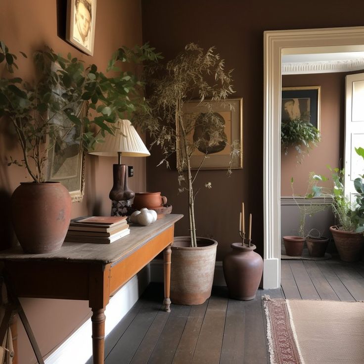 a living room filled with furniture and potted plants on top of a wooden table