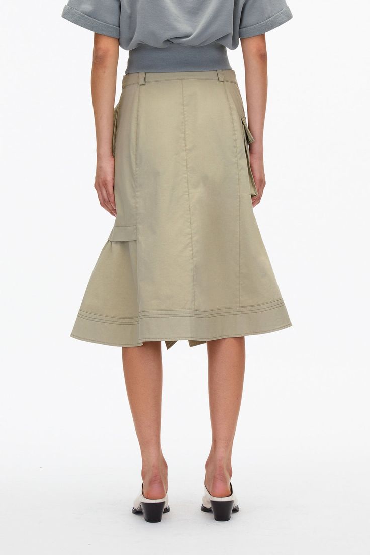 Asymmetrical Cargo Skirt For Workwear, Chic Mini Skirt With Cargo Pockets, Relaxed Cotton Skirt With Patch Pockets, Chic Workwear Skirt With Cargo Pockets, Chic Skirt With Cargo Pockets For Work, Asymmetrical Skirt With Pockets For Work, Tiered Skirt With Side Pockets, Relaxed Work Skirt With Multiple Pockets, Chic Asymmetrical Wrap Skirt With Pockets