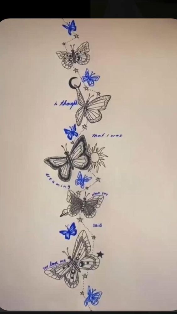 a drawing of butterflies on a white sheet with blue writing in the bottom right corner