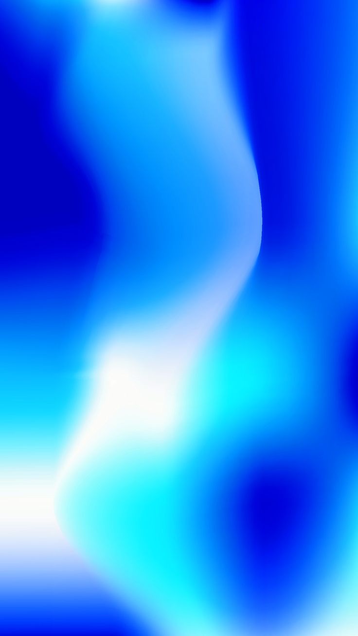 a blurry image of blue and white colors