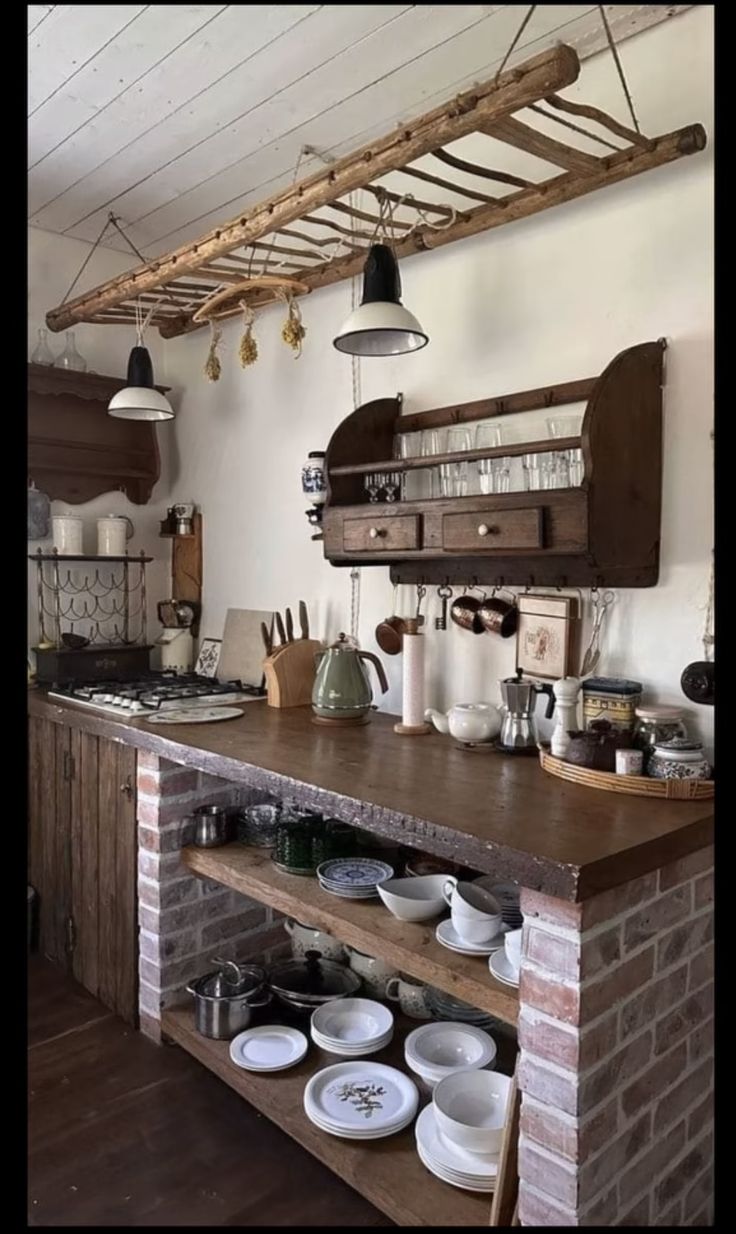 the kitchen is clean and ready to be used for cooking or baking, with dishes on the counter