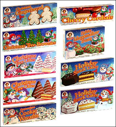 six christmas themed chocolate bars with frosting and decorations on them, all decorated in the same holiday theme