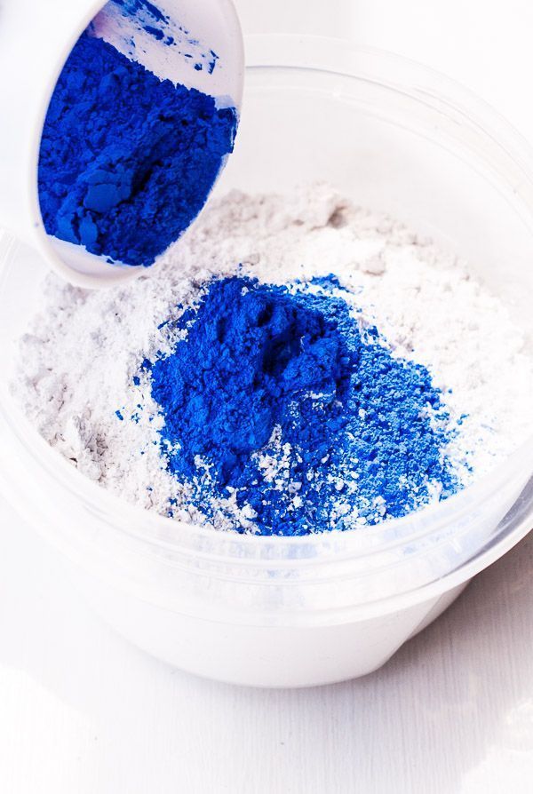 a bowl filled with blue and white powder