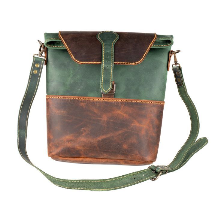 DIMENSIONS: W x H x D: 26 x 31 x 7 COLOR: Green LEATHER TYPE: Vegetable Leather FABRIC: Made from %100 leather. GENDER: Unisex Make a statement with the FIBO Phaselis Green Leather Crossbody Bag. Crafted with 100% leather, this bag boasts adjustable straps to fit any body type, a soft structure, and a secure closure with a flap. Its generous interior gives you plenty of space to store your essentials. Vegetable Leather, Type A, Leather Fabric, Green Bag, Green Leather, Leather Crossbody Bag, Leather Crossbody, Crossbody Bags, Leather Bag