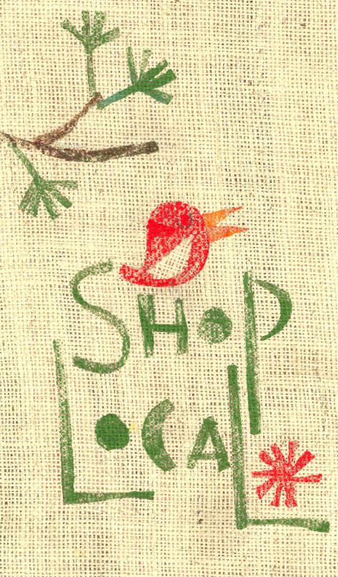 the word shop local written in green and red ink on a piece of linen with a bird