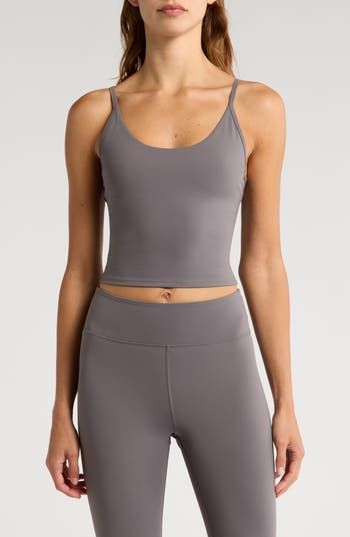 Narrow straps give a cami-hybrid look to a superstretchy tank ideal for workouts and active days. Scoop neck Adjustable straps Partially lined, with pockets to accommodate bra pads 75% nylon, 25% spandex Machine wash, tumble dry Imported Yoga Tank Top With Built-in Bra, Gray Workout Tank Top With Built-in Bra, Workout Gray Tank Top With Built-in Bra, Versatile Activewear With Built-in Bra And Tank Straps, Sporty Tank Activewear With Built-in Bra, Seamless Tank Straps Activewear For Pilates, Gray Athleisure Tank Top With Built-in Bra, Functional Tank Activewear With Built-in Bra, Gym Camisole With Built-in Bra And Tank Straps