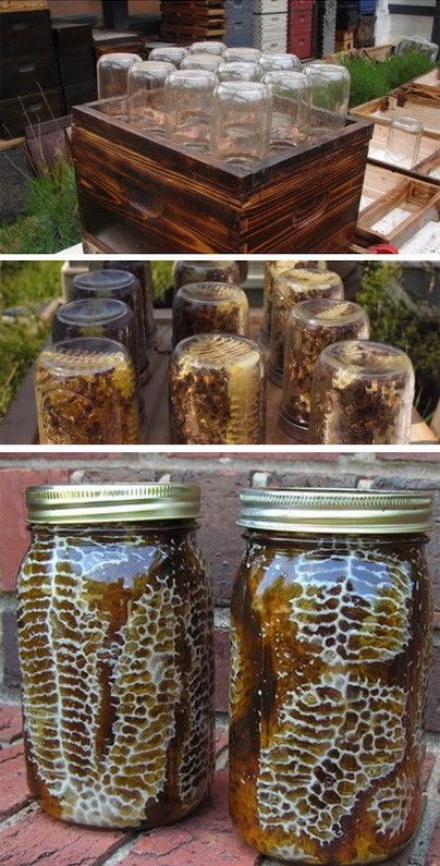 jars filled with honey sitting on top of a brick sidewalk