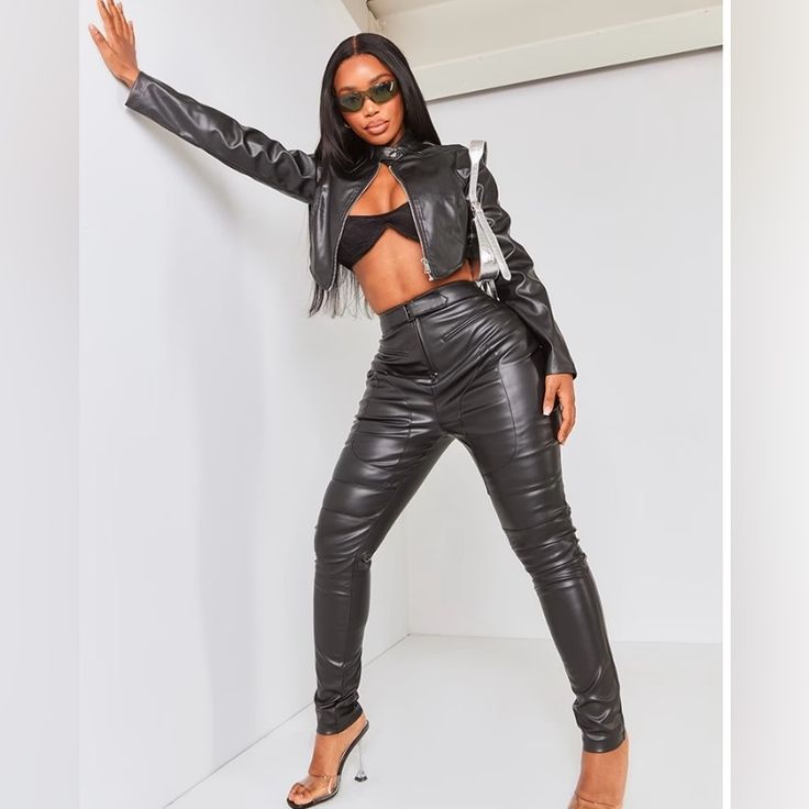 Steal All The Stares This Weekend With These Shape Black Faux Leather Zip Detail Panel Skinny Pants Doll. Brought To You In A Black Faux Leather Material With Zip Detail And A Skinny Fit, It's A Yes From Us. These Shape Pants Are A Must-Have For Your Weekend Wardrobe And Are Sure To Earn You All The Compliments. Style Effortlessly With The Matching Jacket, Clear Heels And Gold Accessories For A Weekend-Worthy Combo. Model Wears Size Uk 8/ Eu 36/ Aus 8/ Us 4 Model Height - 5ft 7" Faux Leather Pants For Club In Fall, Trendy Fitted Leather Pants For Night Out, Sleek Leather Pants For Winter Party, Sleek Leather Pants For Fall Clubbing, Sleek Leather Pants For Club In Fall, Winter Club Faux Leather Pants, High Waist Leather Pants For Club In Fall, High Waist Leather Pants For Club, Fall Season, Fitted Leather Pants For Club In Fall