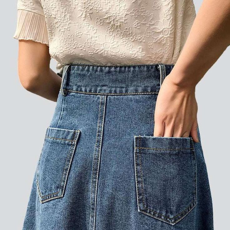 Make a bold statement this spring with our street-style inspired 2023 Spring-Summer a-line button-down denim skirt! Crafted with a high-waisted. slim fit silhouette and classic buttoned closure. this vintage-inspired piece is the perfect balance of fashion and comfort.Key Highlights: A-line Silhouette: Perfectly captures the effortless look of a vintage skirt with a contemporary. a-line fit. Buttoned Closure: Crafted with classic buttons for a timeless look. High-waisted Fit: Designed to hug you Chic Non-stretch Mid-rise Skirt, Denim Skirt With Pockets Short Length, Non-stretch High Waist Denim Skirt For Spring, Chic Mid-rise Skirt With Pockets, Casual Dark Wash Skirt For Everyday, Trendy High-waist Non-stretch Denim Skirt, Trendy High Waist Non-stretch Denim Skirt, High Waist Denim Skirt For Spring, Spring Button-up Solid Color Bottoms