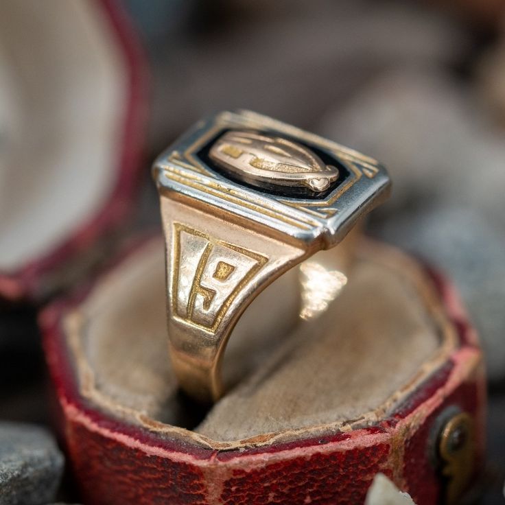 This awesome antique "FHS" class ring dates from 1931 and is crafted of 14k yellow gold. This ring is currently a size 6 and we offer complimentary resizing to fit. We left the ring unpolished with its natural patina. Retro Yellow Gold Rings Stamped 14k, Vintage Gold Enamel Ring Stamped 14k, Heirloom Collectible 14k Stamped Signet Ring, Classic Engraved Enamel Ring, Art Deco Yellow Gold Enamel Ring For Formal Occasions, Art Deco Formal Yellow Gold Enamel Ring, Formal Yellow Gold Art Deco Enamel Ring, Formal Art Deco Yellow Gold Enamel Ring, Gold Art Deco Enamel Ring