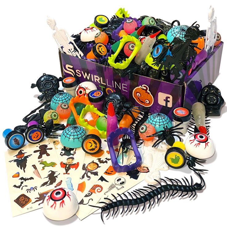 a box filled with lots of assorted halloween decorations and stickers on top of it