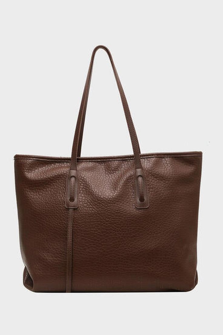 Looking for a stylish and practical bag? Look no further than our PU Leather Tote Bag! Made for women, this bag is perfect for carrying all your essentials with ease. Don't sacrifice fashion for function - our bag has you covered. Upgrade your accessory game today! Bag size: Large Material: PU leather Imported Product measurements:16.5*4.7*12.2 in Versatile Large Capacity Brown Bag, Large Capacity Brown Shoulder Bag For Daily Use, Brown Double Handle Shoulder Bag For Everyday, Brown Faux Leather Tote Bag, Brown Faux Leather Travel Bag, Versatile Everyday Brown Bag, Brown Bags With Large Capacity For Everyday Use, Versatile Brown Tote Bag, Versatile Brown Faux Leather Bag