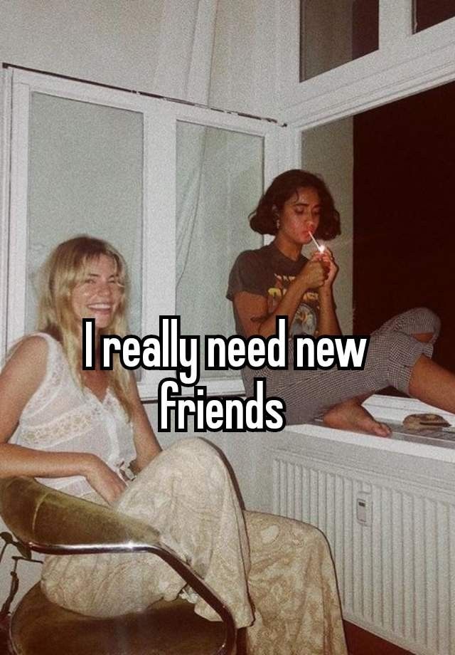 two women sitting on a window sill with the caption i really need new friends