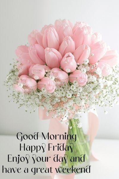 a vase filled with pink flowers and baby's breath