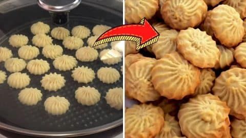 some dumplings are being cooked in a pan and another is cooking on the stove