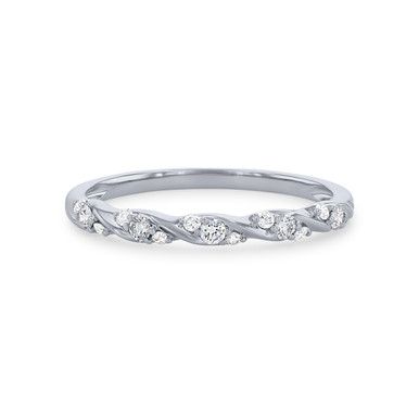 a white gold wedding band with five diamonds