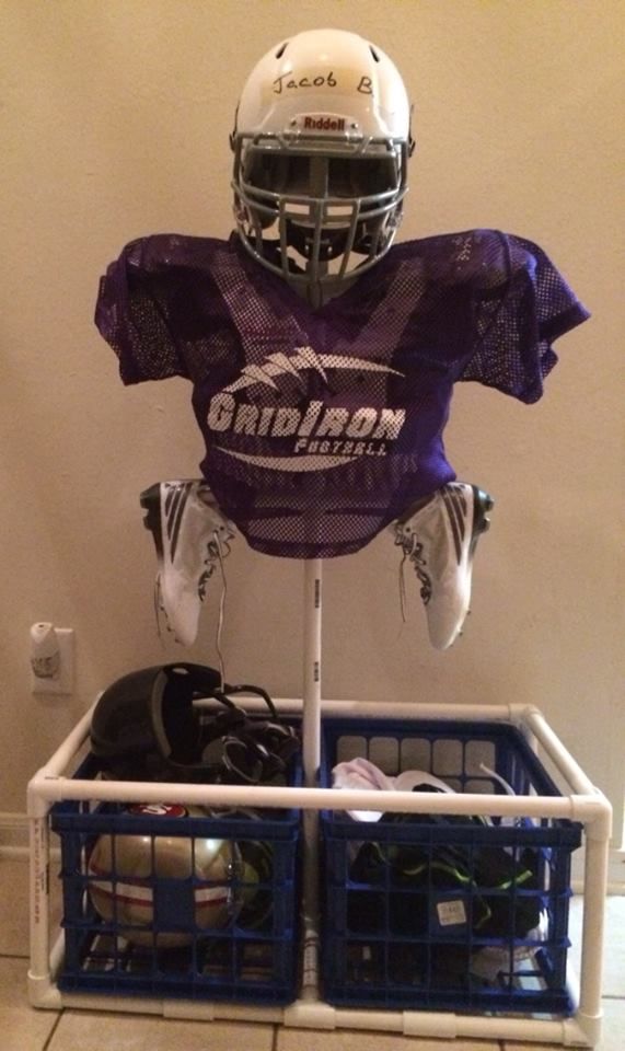 a football uniform and helmet on display in a room