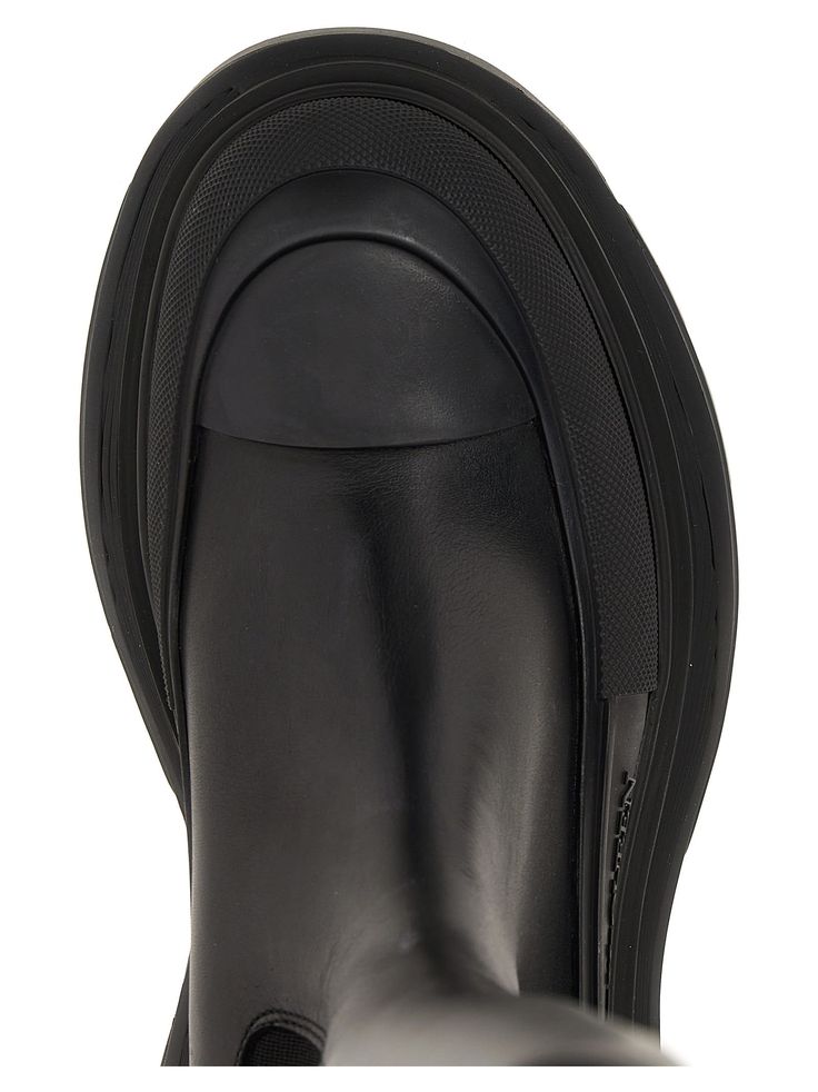 100% Calfskin leather (bos taurus) Sleek Leather Boots With Leather Sole, Sleek Calf Leather Shoes With Round Toe, Modern Calf Leather Shoes With Lug Sole, Leather Slip-on Shoes With Lug Sole, Sleek Leather Shoes, Calf Leather Boots, Alexander Mcqueen Tread Slick, Alexander Mcqueen Sunglasses, Patent Leather Boots