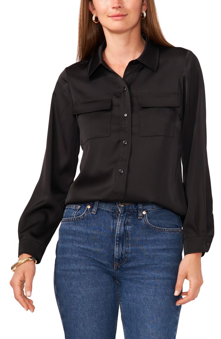 Chest-flap pockets front this polished blouse designed with an easy-moving back pleat and a curved shirttail hem. Spread collar Long sleeves 100% polyester Hand wash, line dry Imported Versatile Workwear Shirt With Shirttail Hem, Black Shirt With Flap Pockets For Work, Black Workwear Shirt With Flap Pockets, Elegant Tops With Pockets And Shirttail Hem, Workwear Blouse With Shirttail Hem, Elegant Blouse With Pockets And Shirttail Hem, Workwear Blouse With Roll-up Sleeves And Shirttail Hem, Casual Office Tops With Flap Pockets, Chic Business Casual Tops With Pockets