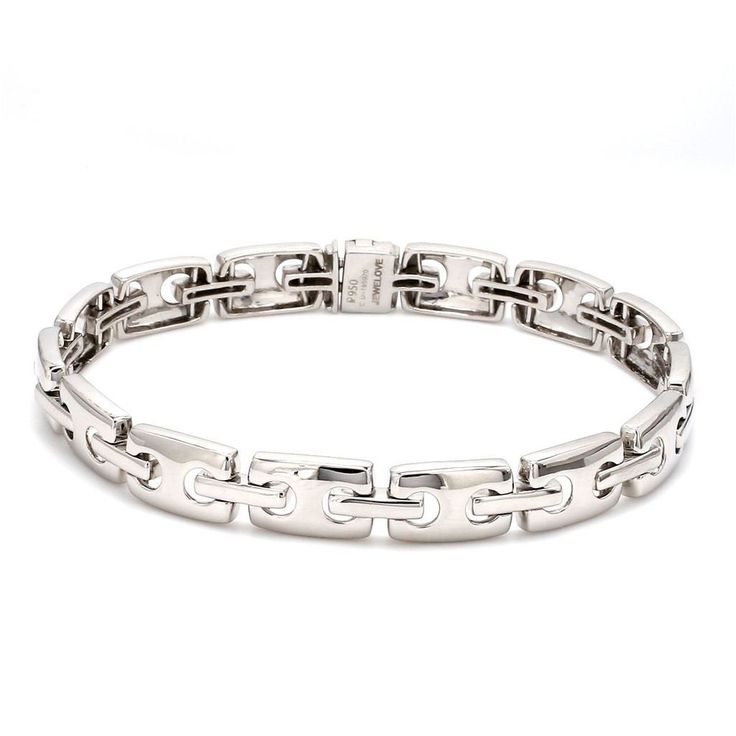 Platinum Bangles & Bracelets by Jewelove Platinum Men's Bracelet A masculine bracelet with rounded-edge rectangular links. The platinum bracelet has a openable clasp lock made in 18K gold. Metal : Platinum Platinum Purity : 95% Purity Mark : Pt 950 Estimated Platinum Weight : 40 grams Certificate of Authenticity : Platinum Guild International Finishing : Hi-polish To order matte or alternating finish, please mention in the special instructions box on the cart page. Classic Link Bracelets With Solid Link Construction, Classic Polished Chain Link Bracelets, Classic Polished Link Bracelets, Classic Link Bracelets With Polished Finish, Modern White Gold Bracelet With Stainless Steel Clasp, Elegant Formal Chain Bracelet With Stainless Steel Clasp, Elegant Chain Link Bracelet With Stainless Steel Clasp, Minimalist Sterling Silver Bracelet With Rectangular Links, Formal Link Bracelet With Bracelet Strap