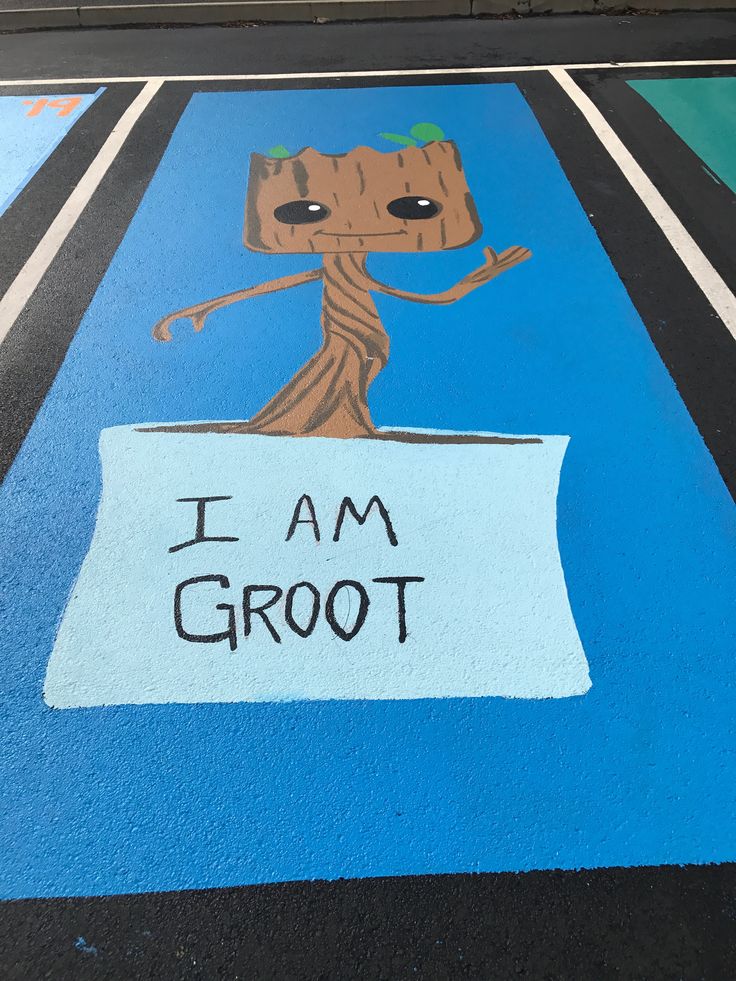 a painted image of a groote on the side of a road with i am groot written on it