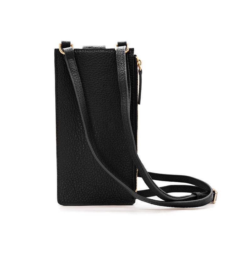 A miniature marvel of form and function, the Paris Phone Pouch holds all your necessary essentials securely in style. Made of gorgeous black Italian leather, it stores any sized phone in the main compartment, plus there’s also three credit card/ID pockets. Securing your phone in place with a top flap snap, this crossbody-style bag also has a side zipped section for keys and other must-haves. The Paris is perfect for a night out when a little bag goes a long way — just toss the adjustable 55" str On-the-go Phone Bag With Interior Card Slots, Black Wallet With Removable Pouch For On-the-go, Black Leather Phone Bag For On-the-go, On-the-go Phone Bag Pouch With Interior Card Slots, Versatile Black Business Phone Bag, Black Phone Bag With Interior Card Slots For Everyday, Black Phone Bag With Cell Phone Pocket For Travel, Black Travel Phone Bag With Cell Phone Pocket, Modern Black Phone Bag For On-the-go