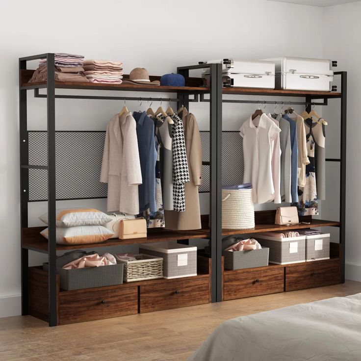 an organized closet with clothes hanging on the rails and drawers, along with other items