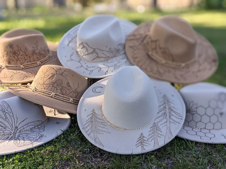 These beautiful felt hats are all hand-burned in the Ozark Mountains. Feel free to message for more pictures as there are often more details on the other sides! One size fits most.