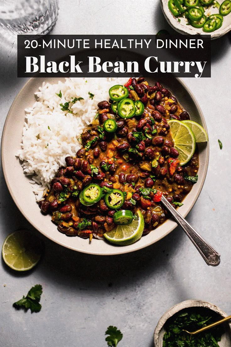 a white plate topped with beans and rice