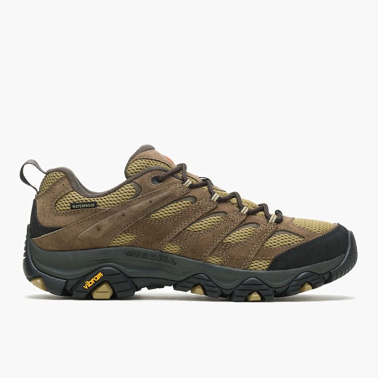 the men's hiking shoe is brown and black