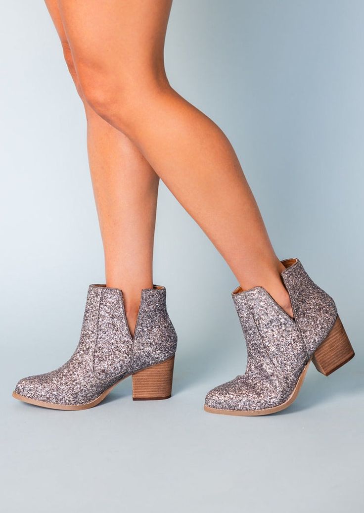 NOTHING quite says 'I'm here for the party' like a pair of glitter booties. Rubber heel and sole. 3 inch heel Fit true to size, if you are in between sizes, go with your larger size. If your foot is wide at all, also size up. Athleisure Tops, Sparkly Dress, Waterproof Jewelry, 3 Inch Heels, Judy Blue Jeans, Denim Leggings, Sleek Fashion, Swim Accessories, Rubber Heels