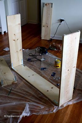 the room is being prepared for painting and remodeling with wood planks