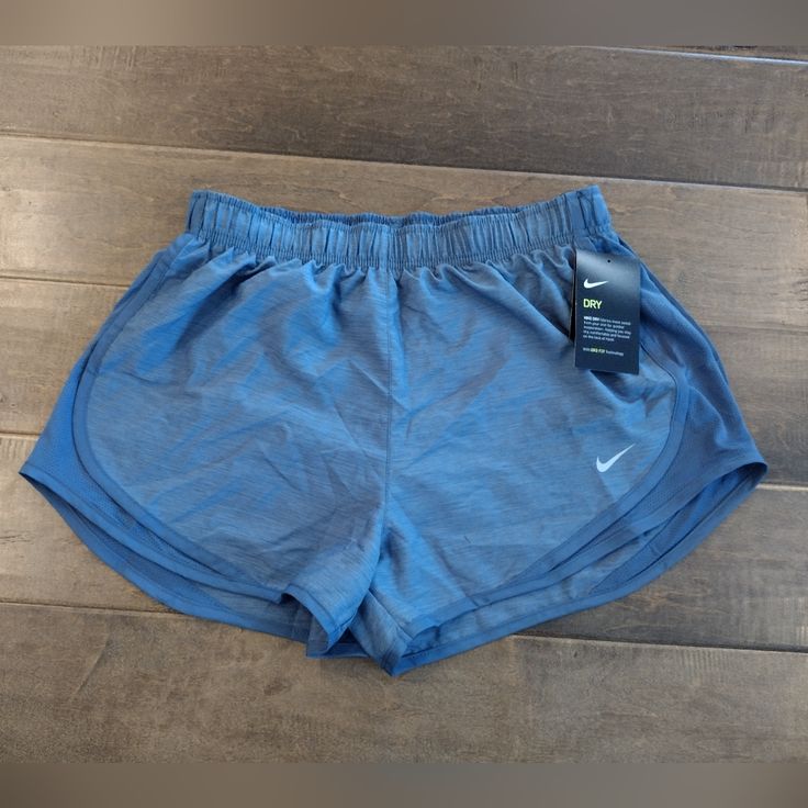 Nike Women's Nwt Dusty Blue Dri-Fit Shorts - M. Women's Size M Medium. Please See Photos For Measurements. Nwt. Tags Attached, Never Worn. Nike Blue Running Shorts, Swim Shorts Women, Nike Tempo, Running Shorts Women, Comfy Clothes, Christmas Inspo, Nike Running Shorts, Shorts Nike, Nike Blue