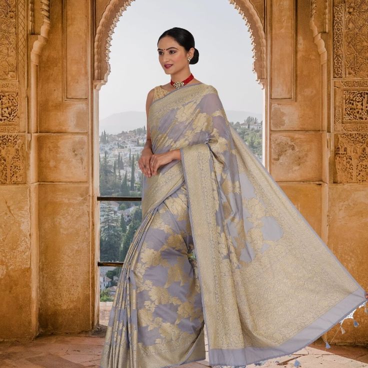 Introducing the stunning Steel Gray soft khaddi Georgette banarasi saree! This exquisite saree is crafted from the finest quality gray Georgette, with beautiful gold weaving and a pallu that is sure to turn heads. The fall and pico are perfectly done, and the matching blouse has been stitched so that you can unbox your saree and it is ready to go. Whether you are looking for something to wear to a special event or just want to treat yourself to a luxurious saree, this is the perfect choice. The Luxurious Saree, Khaddi Georgette Banarasi Saree, Georgette Banarasi Saree, Reception Outfits, Sari Blouse, Banarasi Saree, Steel Grey, Banarasi Sarees, Blouse Piece